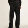 Svarta herrjeans med lös passform och kristaller med gradienteffekt över hela byxan