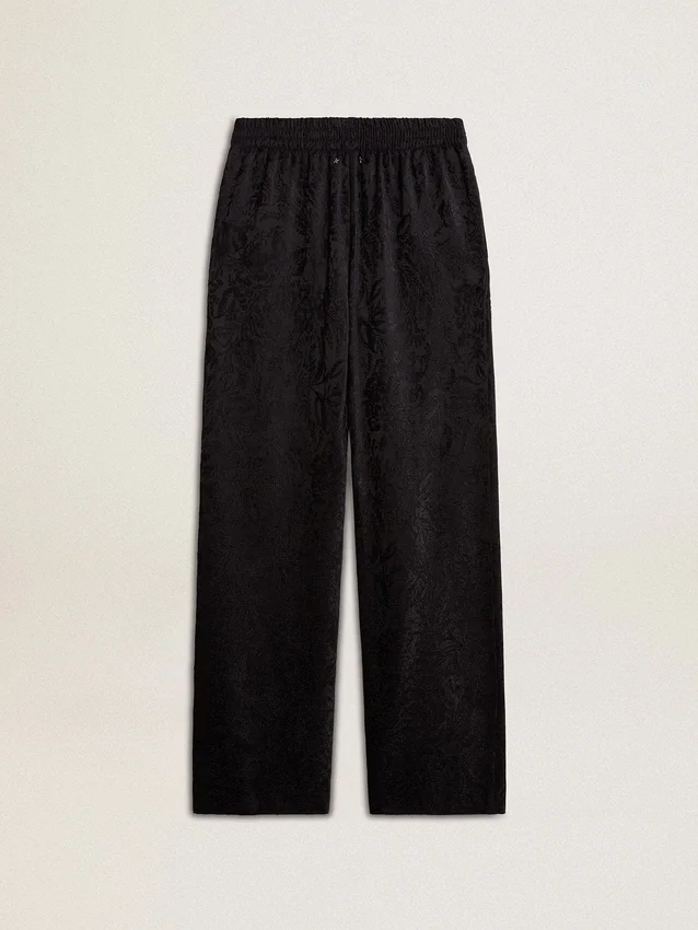 Svarta joggingbyxor för dam med ton-i-ton-mönster i toile de jouy-stil