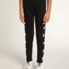 Svarta leggings för flickor med vita stjärnor på sidorna