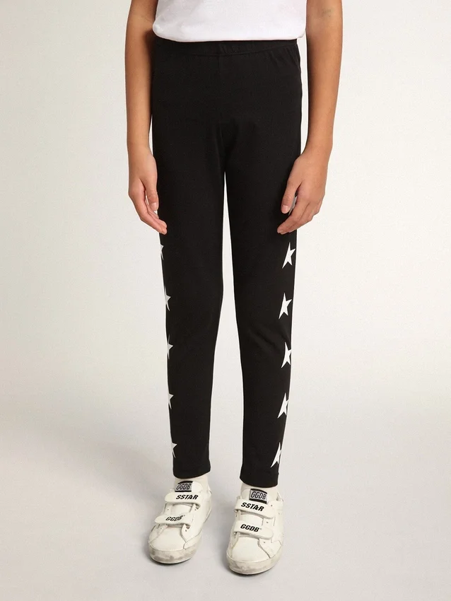 Svarta leggings för flickor med vita stjärnor på sidorna