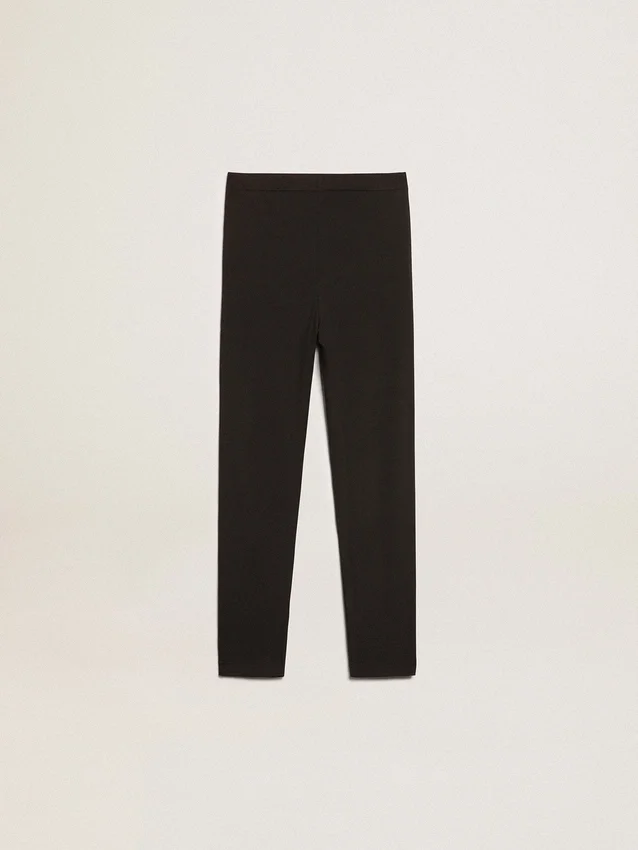 Svarta leggings för flickor med vita stjärnor på sidorna