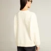 Sweatshirt i åldrat vitt med omvänt logo på ryggen – Jersey Capsule