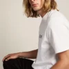 T-shirt från White Star Collection med kontrasterande svart logotyp och stjärna