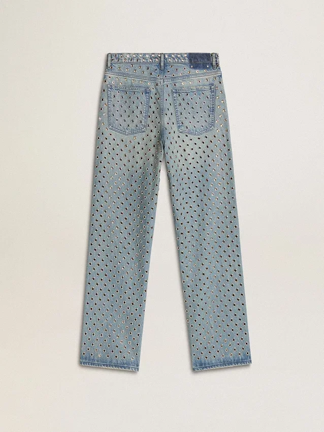 Tvättade damjeans med öglor över hela byxan