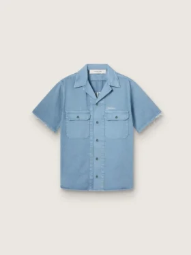 Unisex-skjorta i ljusblå denim med broderi på ryggen