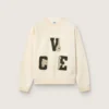 Unisex-sweatshirt i bomull i vintagevitt med broderade VCE-märken