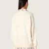 Unisex-sweatshirt i bomull i vintagevitt med broderade VCE-märken