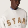 Unisex-sweatshirt i grå melerad bomull med broderat ”Star”-märke