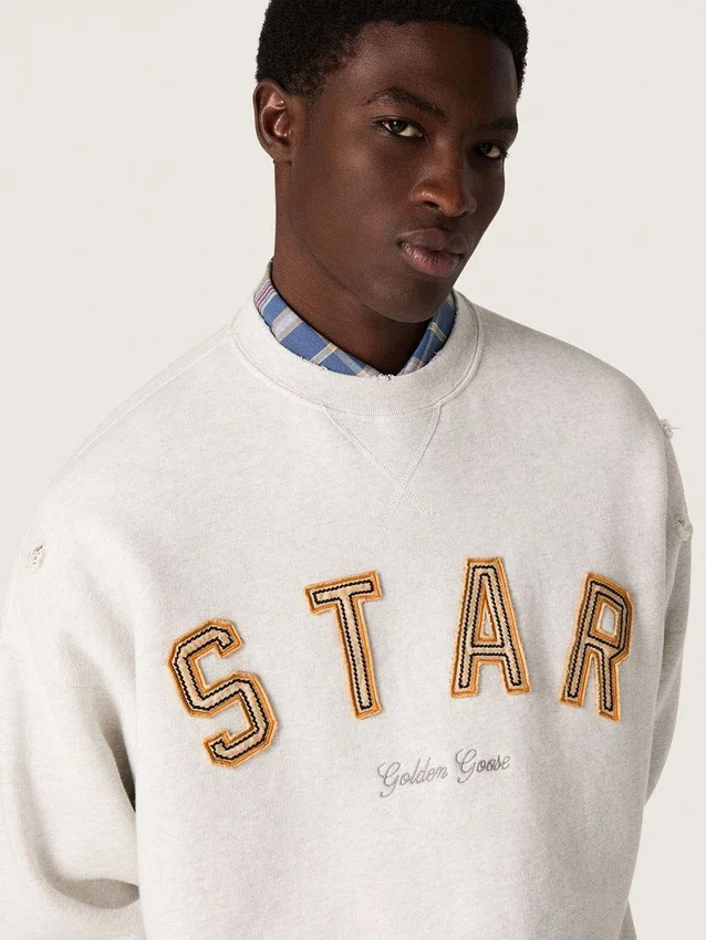 Unisex-sweatshirt i grå melerad bomull med broderat ”Star”-märke