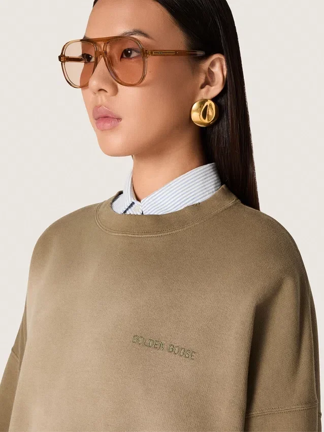 Unisex-sweatshirt i militärgrön bomull med blekt utseende och broderad logotyp
