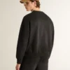 Unisex-sweatshirt i sliten svart bomull med broderad logotyp