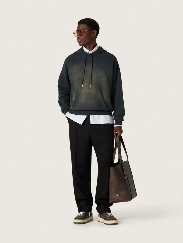 Unisex-sweatshirt med huva i svart bomull med blekt effekt