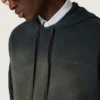 Unisex-sweatshirt med huva i svart bomull med blekt effekt