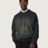Unisex-sweatshirt med huva i svart bomull med blekt effekt