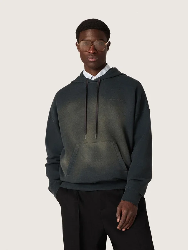 Unisex-sweatshirt med huva i svart bomull med blekt effekt