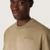 Unisex-t-shirt i beige bomullsjersey med broderad logotyp