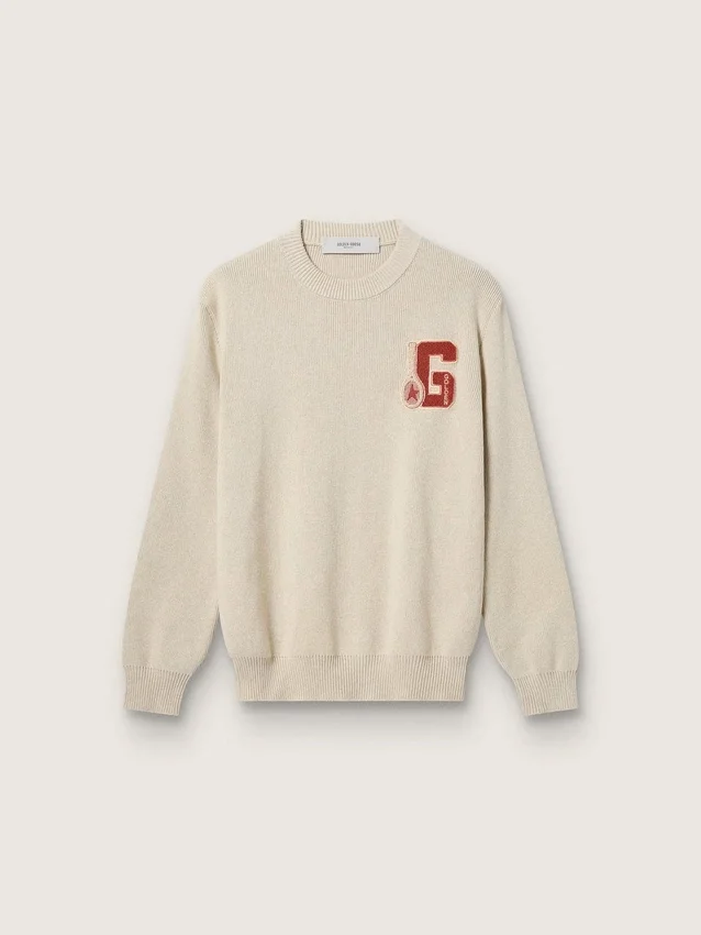 Unisex-tröja med rund hals i beige bomull med patch på framsidan och logotyp på baksidan