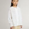 Vit bomullsskjorta med broderie anglaise för flickor
