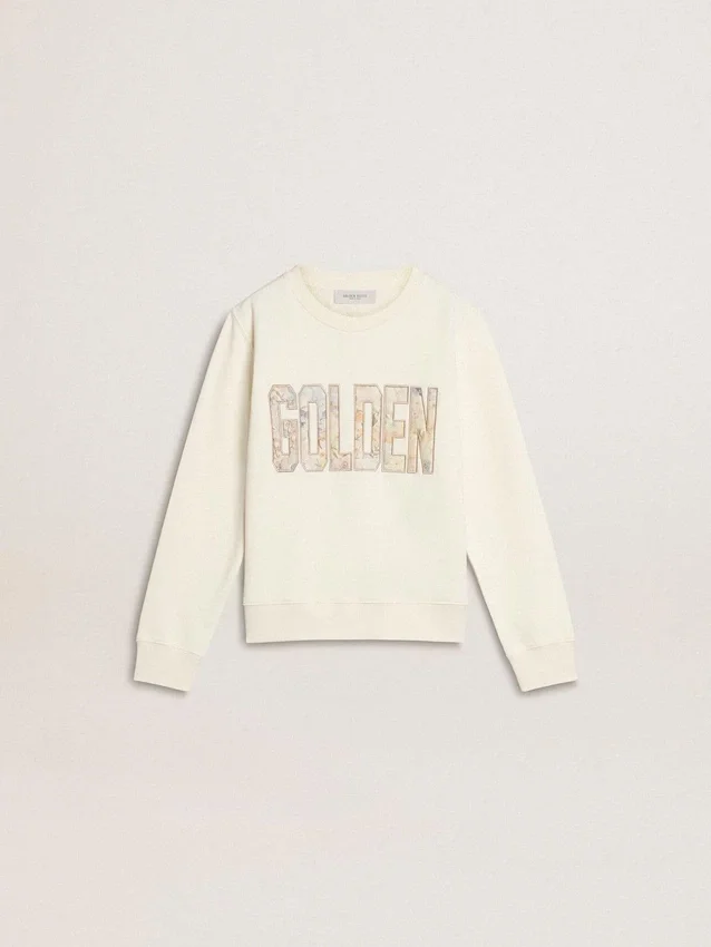Vit sweatshirt för flickor med mångfärgad guldfärgad text på framsidan
