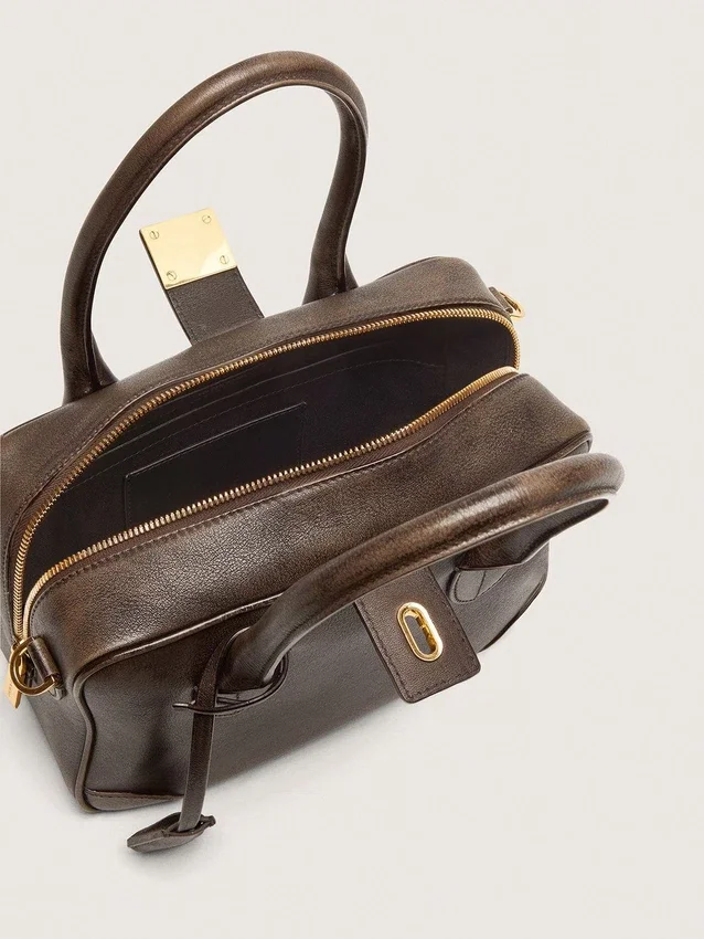 Vita-väska i brunt vintage-läder med gulddetaljer